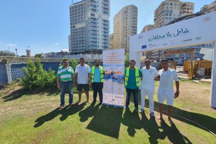 Coastal Cleanup group picture with TouMaLi banner